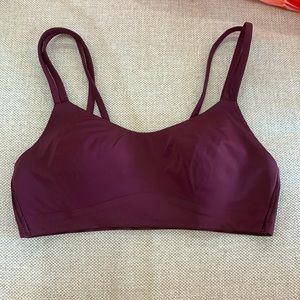 This is a dark purple sports bra.